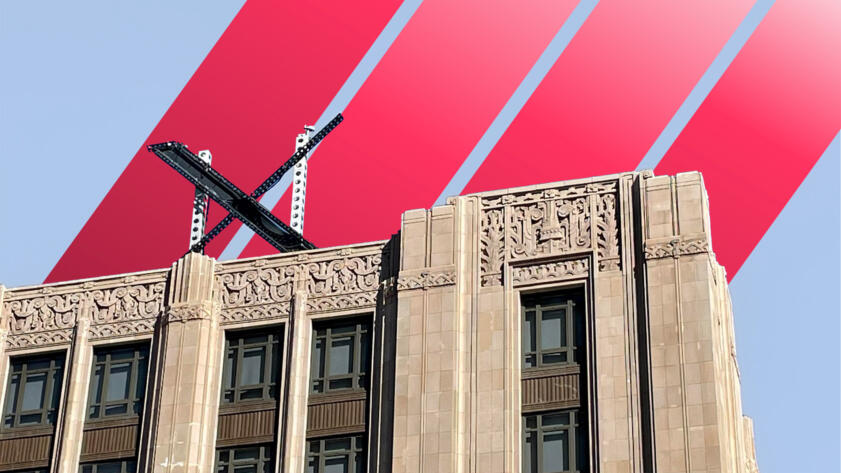 Twitter/X headquarters with red bars in the sky.